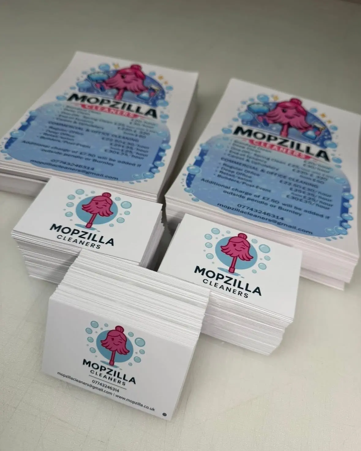 Custom printed business cards for cleaning company branding